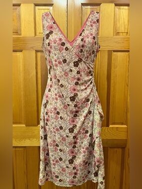 Daren sleeveless wrap style dress with side ruffle